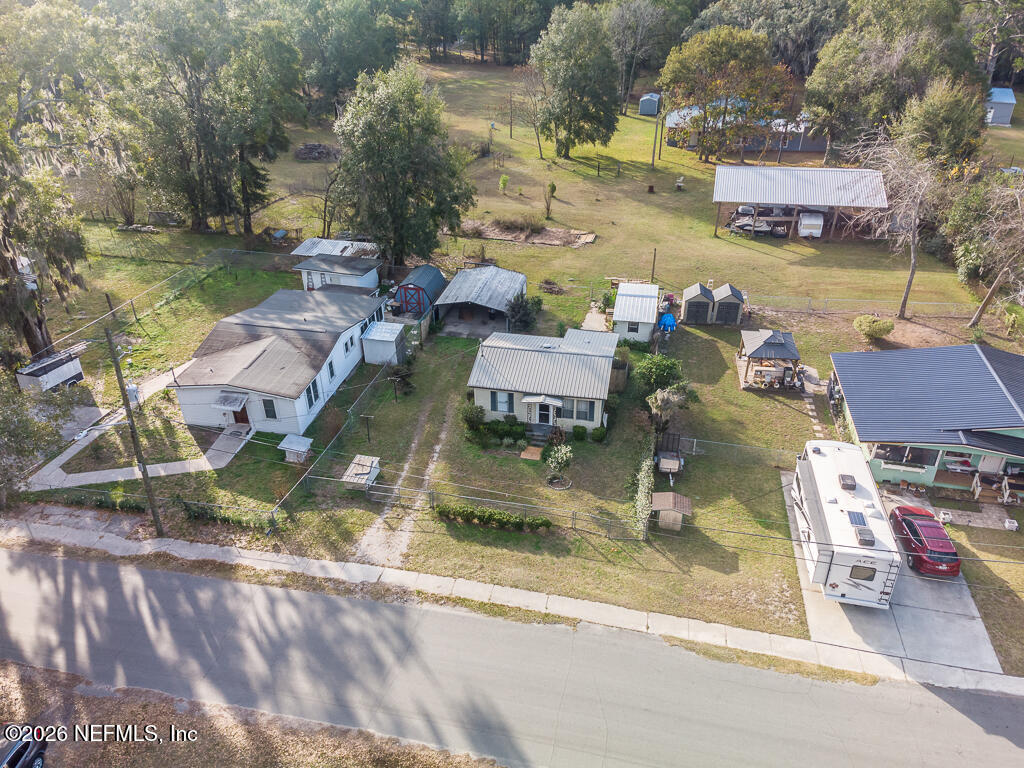 8034 Gordean Road Jacksonville, FL 32221 - Photo 3 of 37 an aerial view of residential houses with outdoor space