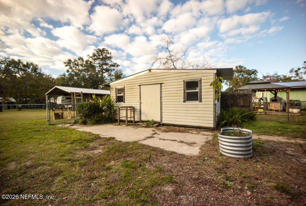 8034 Gordean Road Jacksonville, FL 32221 - Photo 35 of 37 a view of a house with a yard