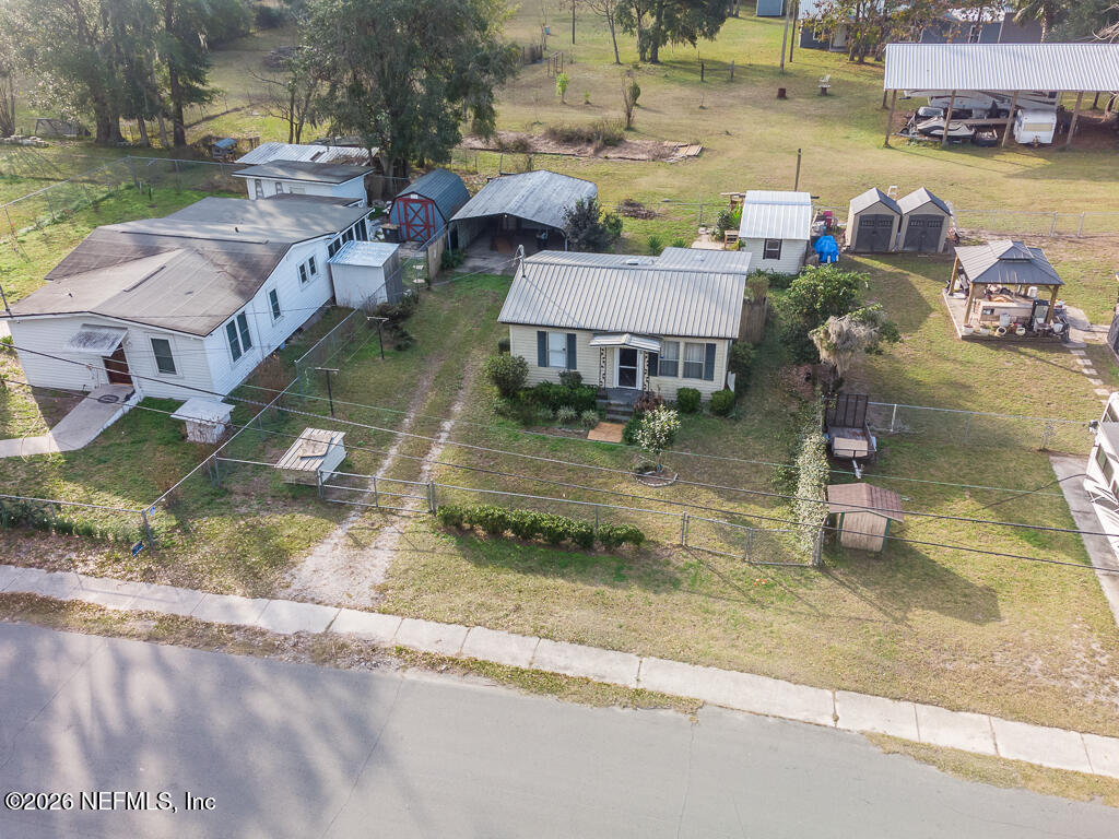 8034 Gordean Road Jacksonville, FL 32221 - Photo 4 of 37 an aerial view of a house with a yard