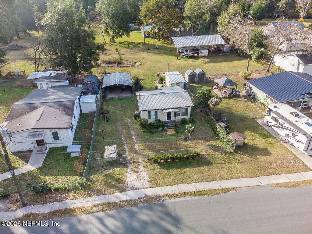 8034 Gordean Road Jacksonville, FL 32221 - Photo 5 of 37 a view of swimming pool with outdoor seating and lake view