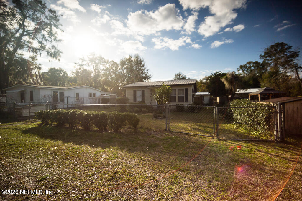 8034 Gordean Road Jacksonville, FL 32221 - Photo 8 of 37 a view of a house with a yard