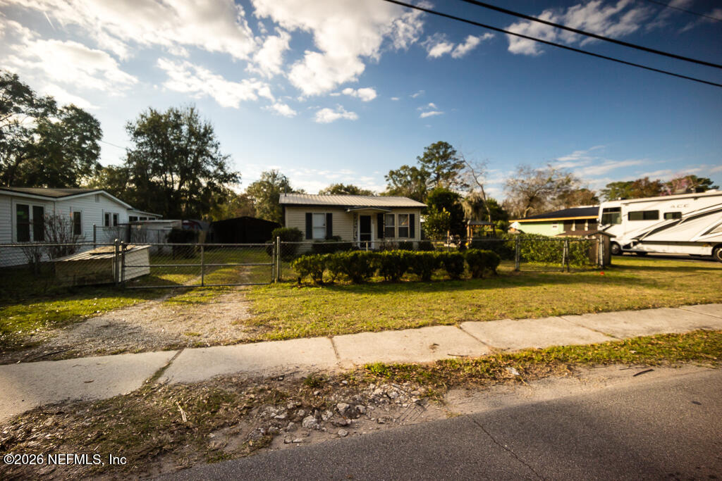 8034 Gordean Road Jacksonville, FL 32221 - Photo 9 of 37 a view of a house with a yard