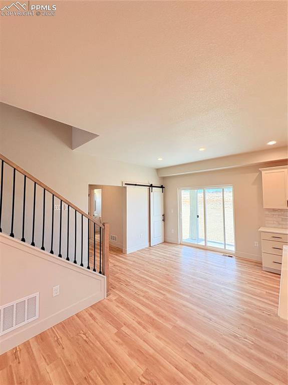 810 Keystone Loop Canon City, CO 81212 - Photo 12 of 13 a view of a room with wooden floor and fence