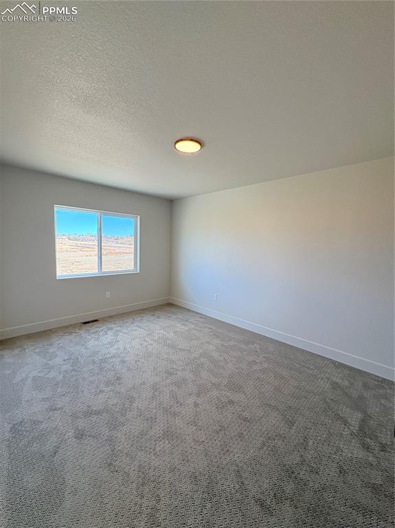 810 Keystone Loop Canon City, CO 81212 - Photo 10 of 13 a view of an empty room with a window