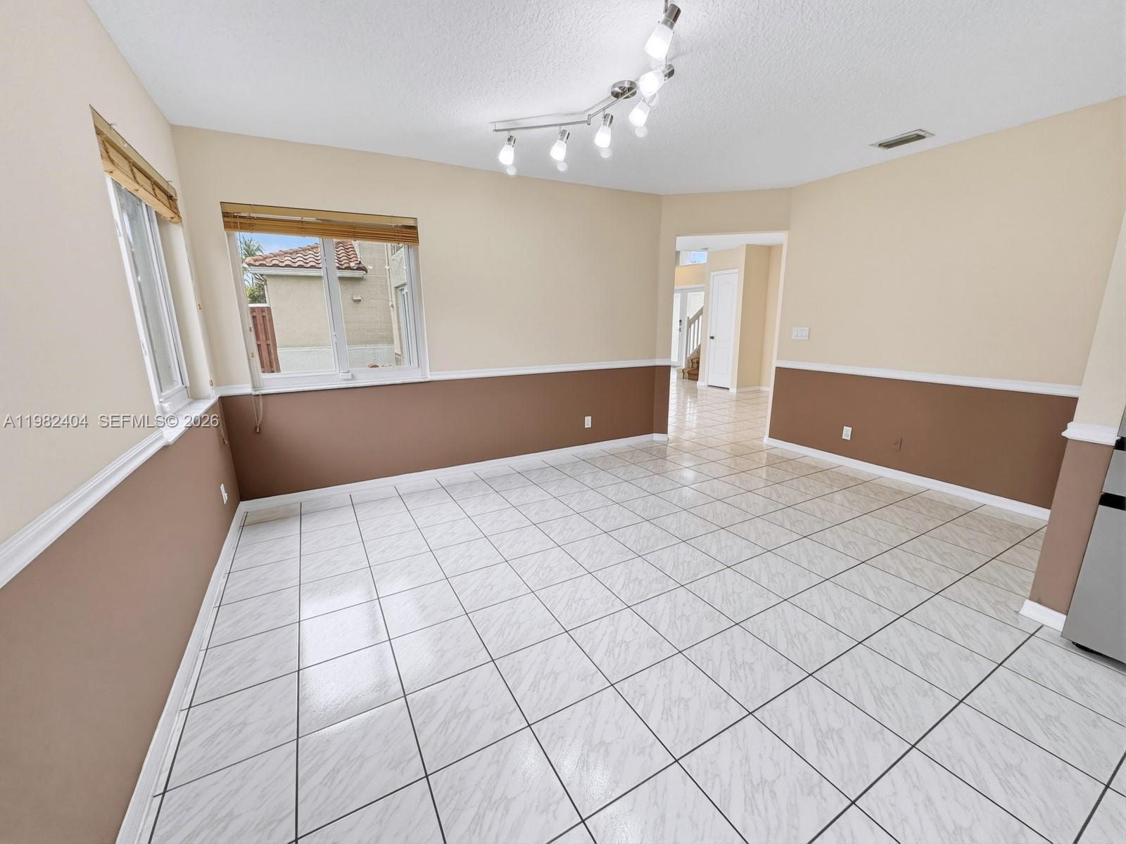 2640 Rampart Way North Cooper City, FL 33026 - Photo 18 of 58 a view of an empty room and window