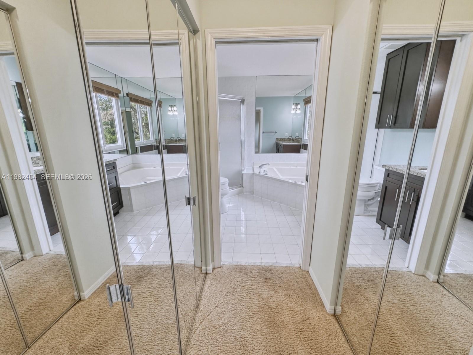 2640 Rampart Way North Cooper City, FL 33026 - Photo 27 of 58 a bathroom with a glass door shower and a sink