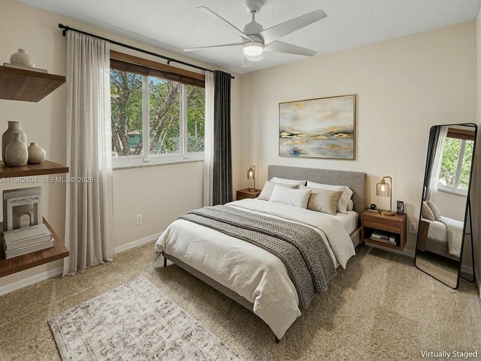 2640 Rampart Way North Cooper City, FL 33026 - Photo 32 of 58 a bedroom with a bed painting on wall and a large window