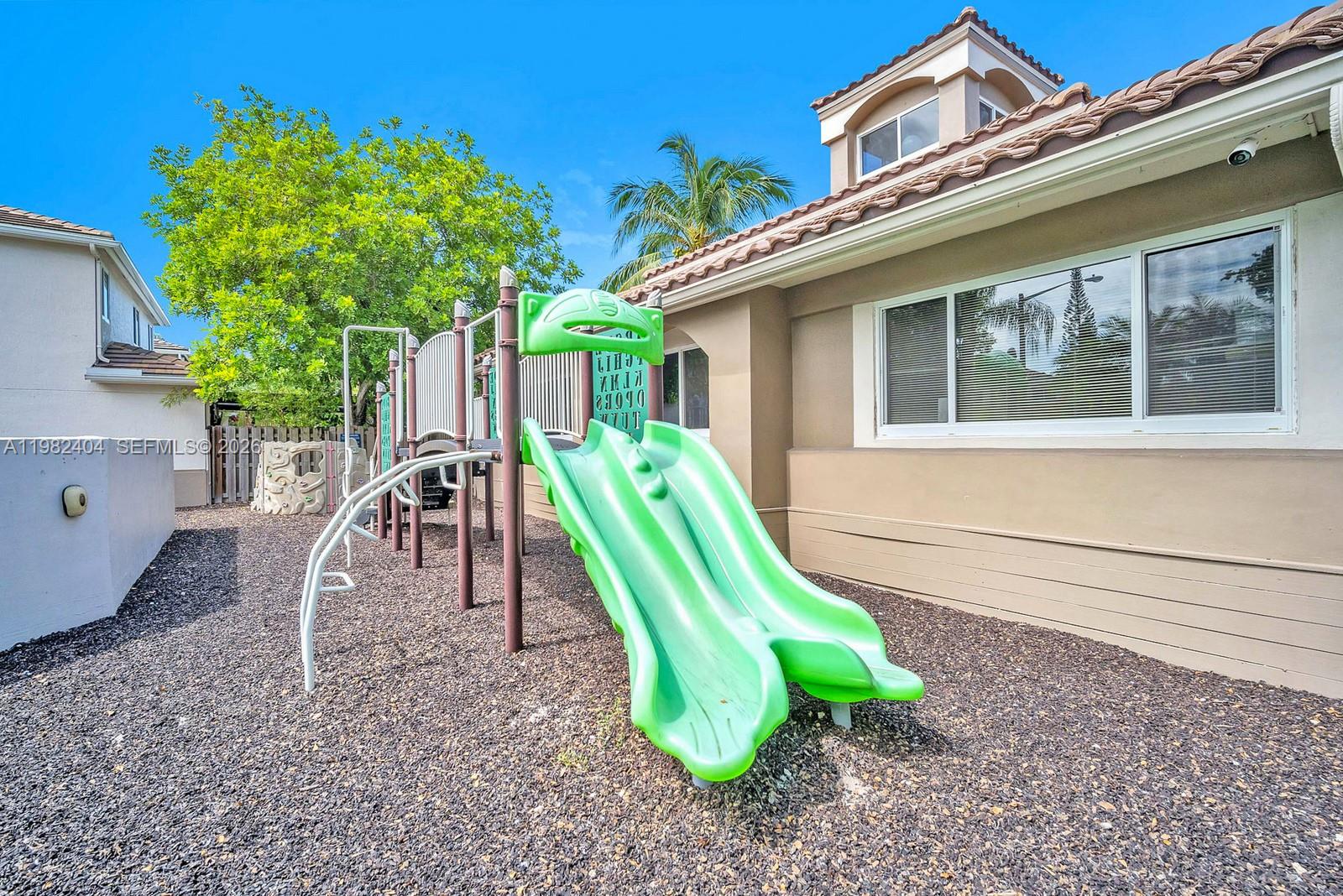 2640 Rampart Way North Cooper City, FL 33026 - Photo 50 of 58 a view of a house with a backyard