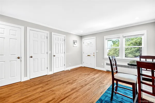 a bedroom with a bed and a table