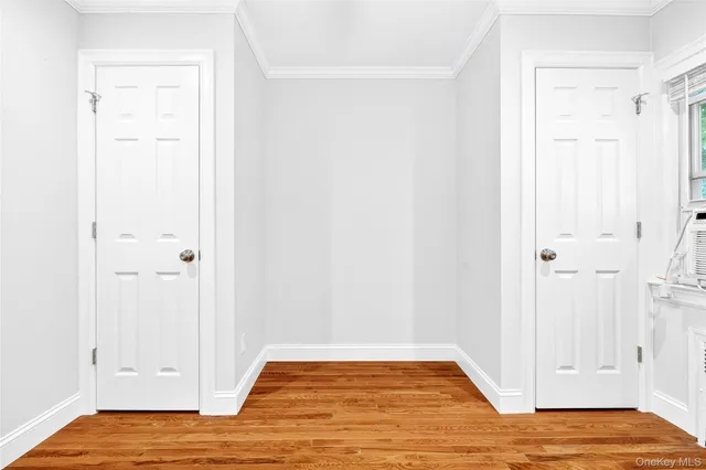 a view of room with hardwood floor