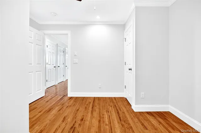 a bathroom with a sink mirror and vanity