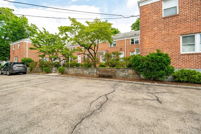 a view of a house with a street