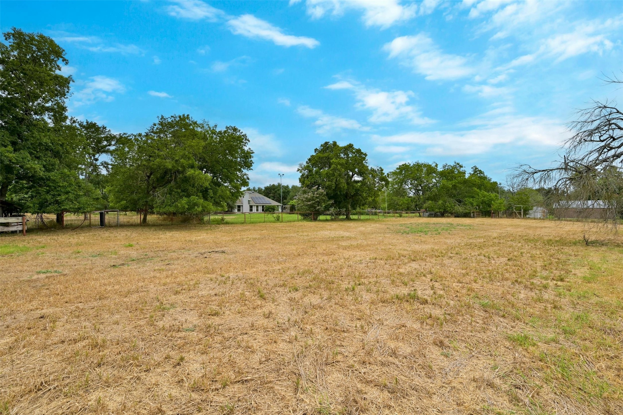 20 Pillow Road Sunset Valley, TX 78745 - Photo 11 of 17 a view of yard with swimming pool and green space
