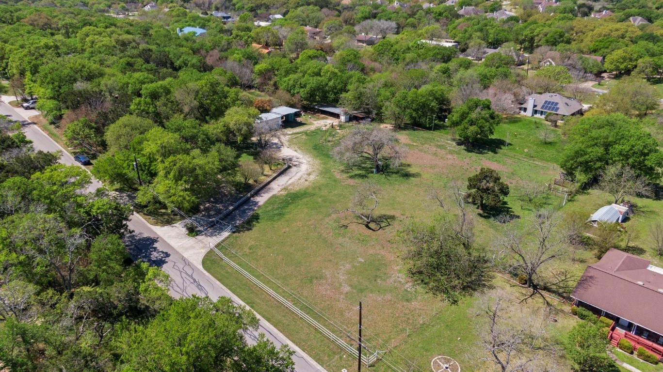 20 Pillow Road Sunset Valley, TX 78745 - Photo 4 of 17 an aerial view of residential house with outdoor space and trees all around
