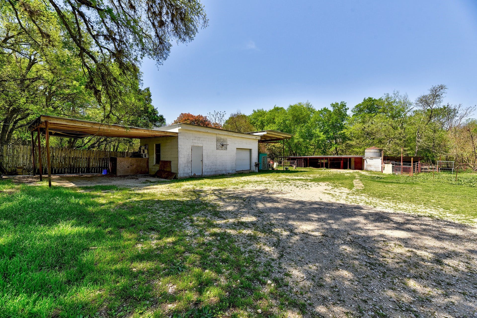 20 Pillow Road Sunset Valley, TX 78745 - Photo 7 of 17 a view of a house with a yard