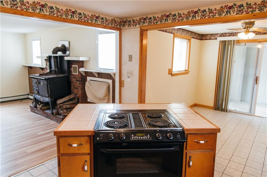 103 Long Swamp Road Lebanon, ME 04027 - Photo 8 of 24 The kitchen is adjacent to both the...