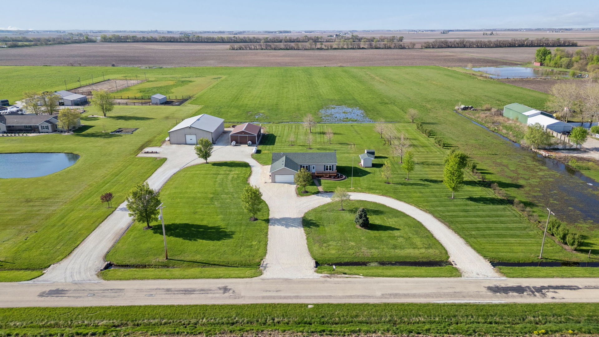 15334 West 3000N Road Essex, IL 60935 - Photo 1 of 42 a view of a swimming pool with a yard
