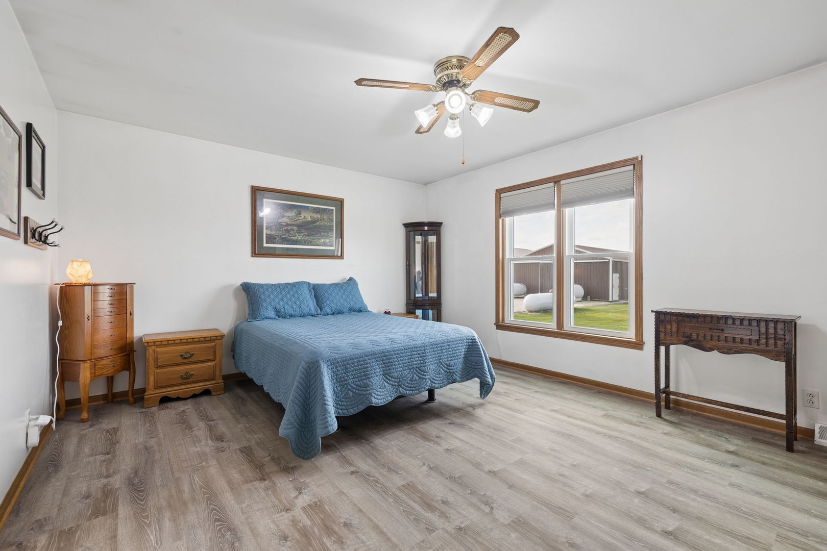 15334 West 3000N Road Essex, IL 60935 - Photo 13 of 42 a spacious bedroom with a bed and a table in it