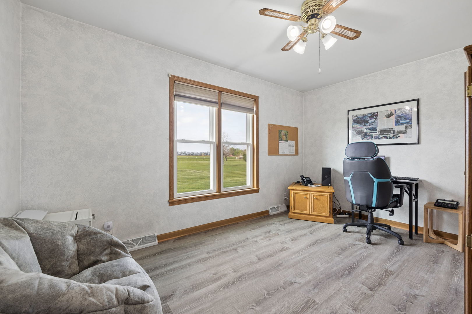 15334 West 3000N Road Essex, IL 60935 - Photo 19 of 42 a living room with furniture and a window