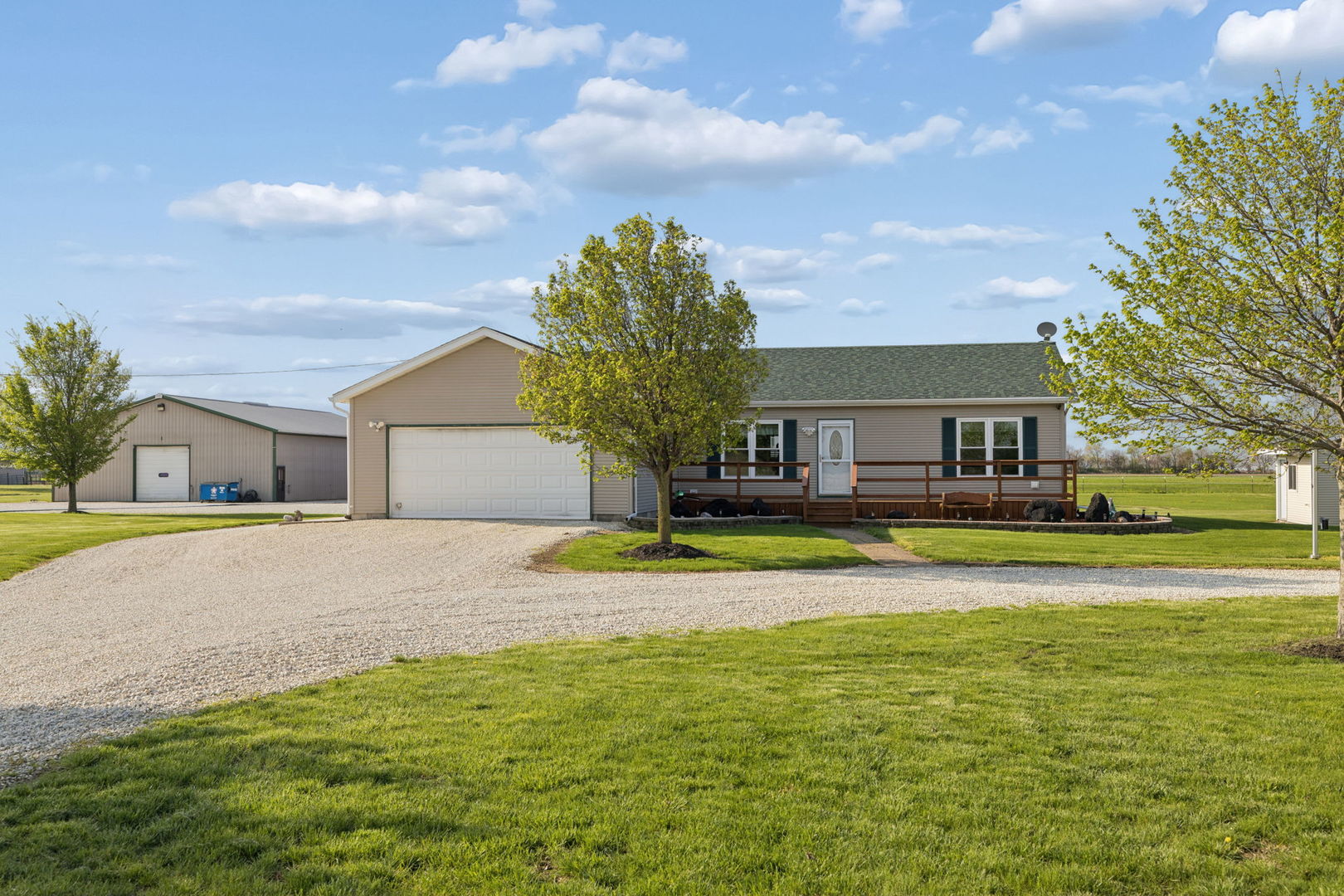 15334 West 3000N Road Essex, IL 60935 - Photo 2 of 42 a house with swimming pool in front of it