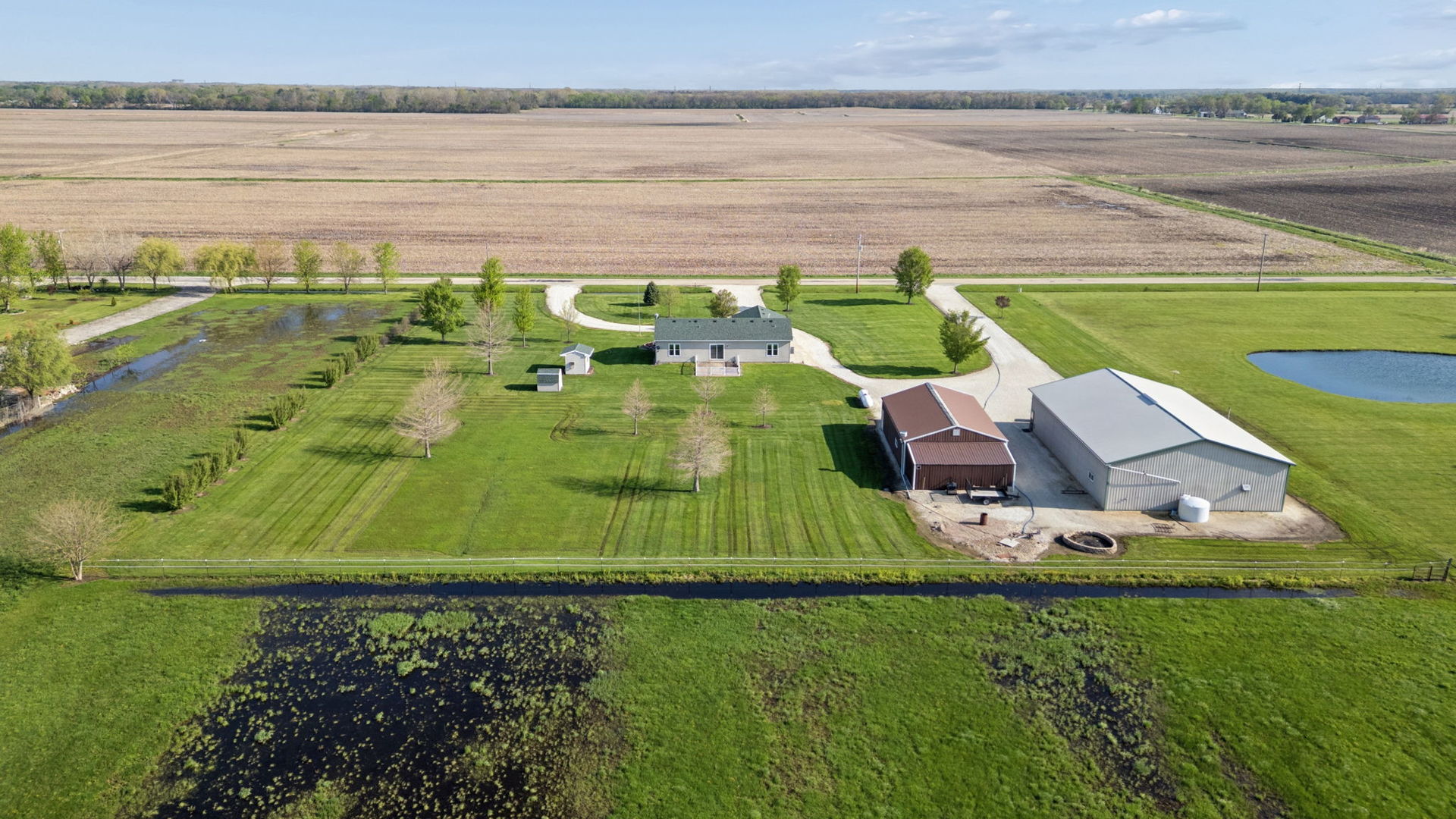 15334 West 3000N Road Essex, IL 60935 - Photo 23 of 42 a view of a swimming pool with a yard