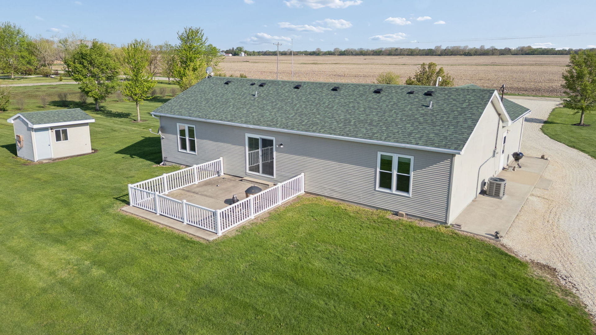 15334 West 3000N Road Essex, IL 60935 - Photo 25 of 42 a aerial view of a house with a yard and a patio