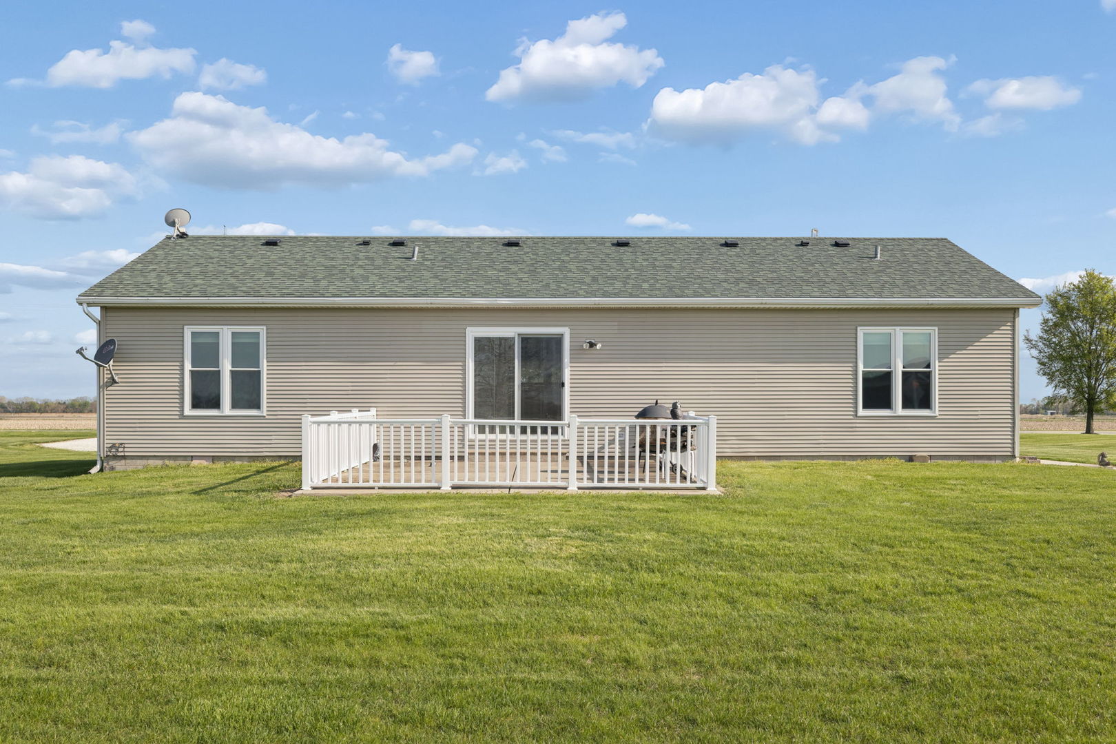 15334 West 3000N Road Essex, IL 60935 - Photo 29 of 42 a front view of a house with a garden