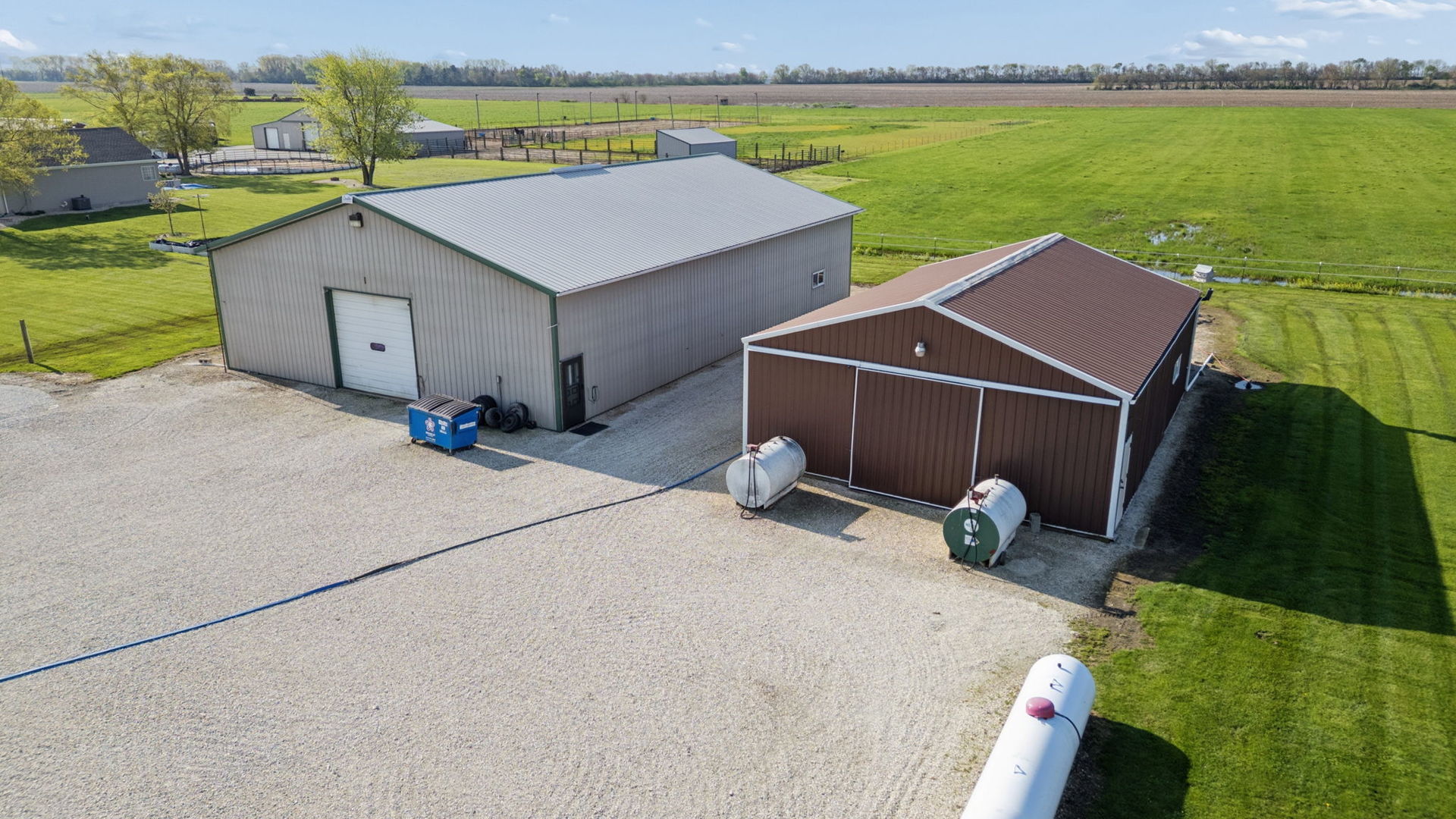 15334 West 3000N Road Essex, IL 60935 - Photo 4 of 42 an aerial view of a house with a garden and lake view