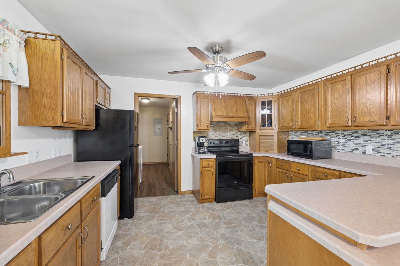 15334 West 3000N Road Essex, IL 60935 - Photo 5 of 42 a kitchen with a sink stove and refrigerator