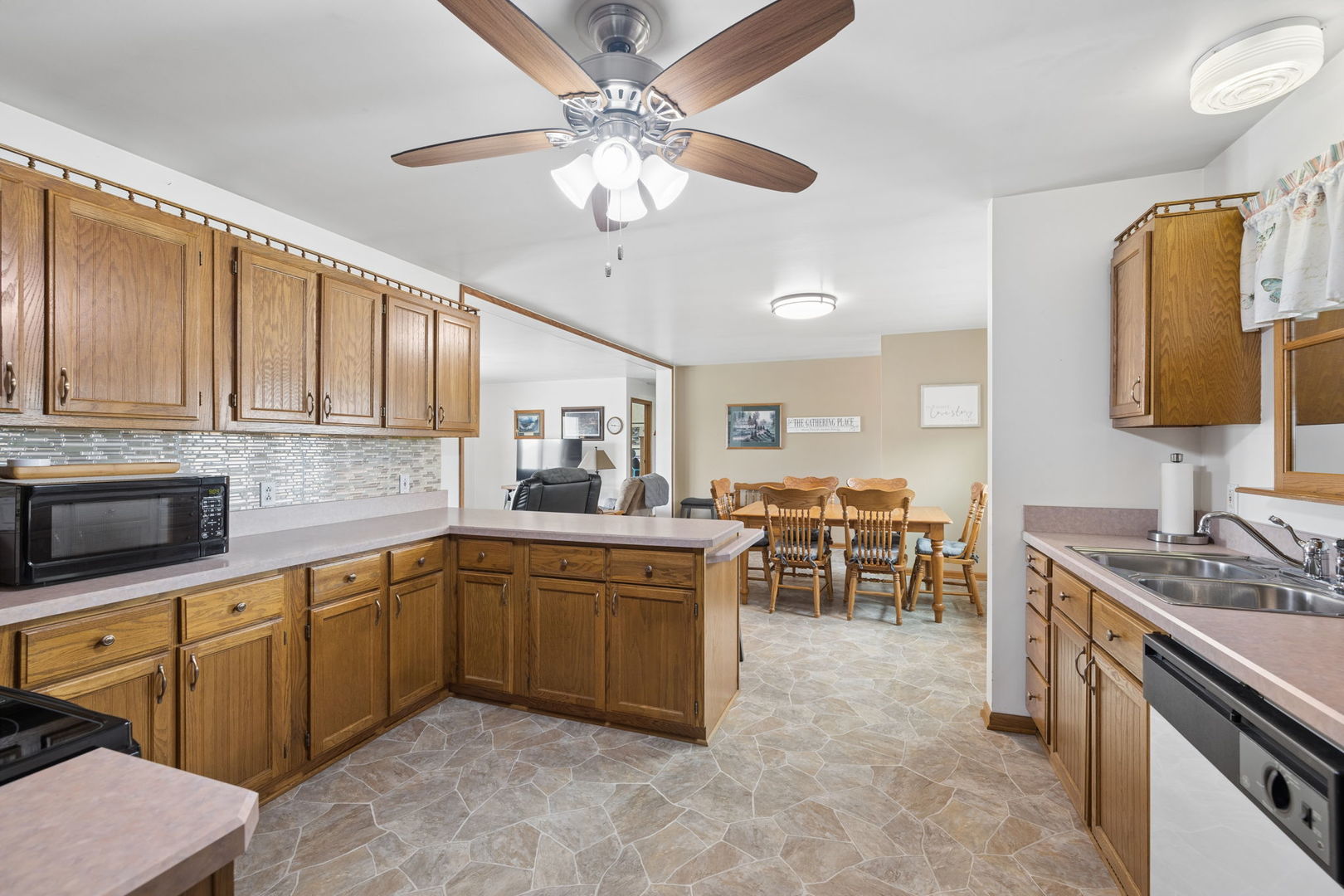 15334 West 3000N Road Essex, IL 60935 - Photo 7 of 42 a kitchen with lots of counter top space and stainless steel appliances