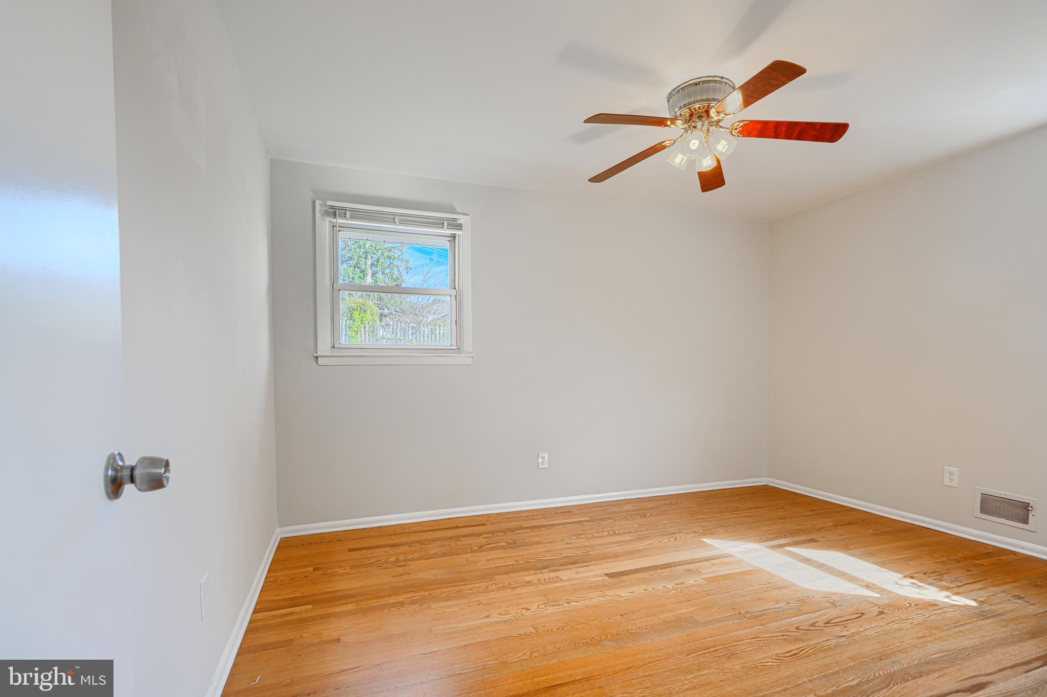 1741 Ellinwood Road Rosedale, MD 21237 - Photo 16 of 43 a view of a room with wooden floor and window
