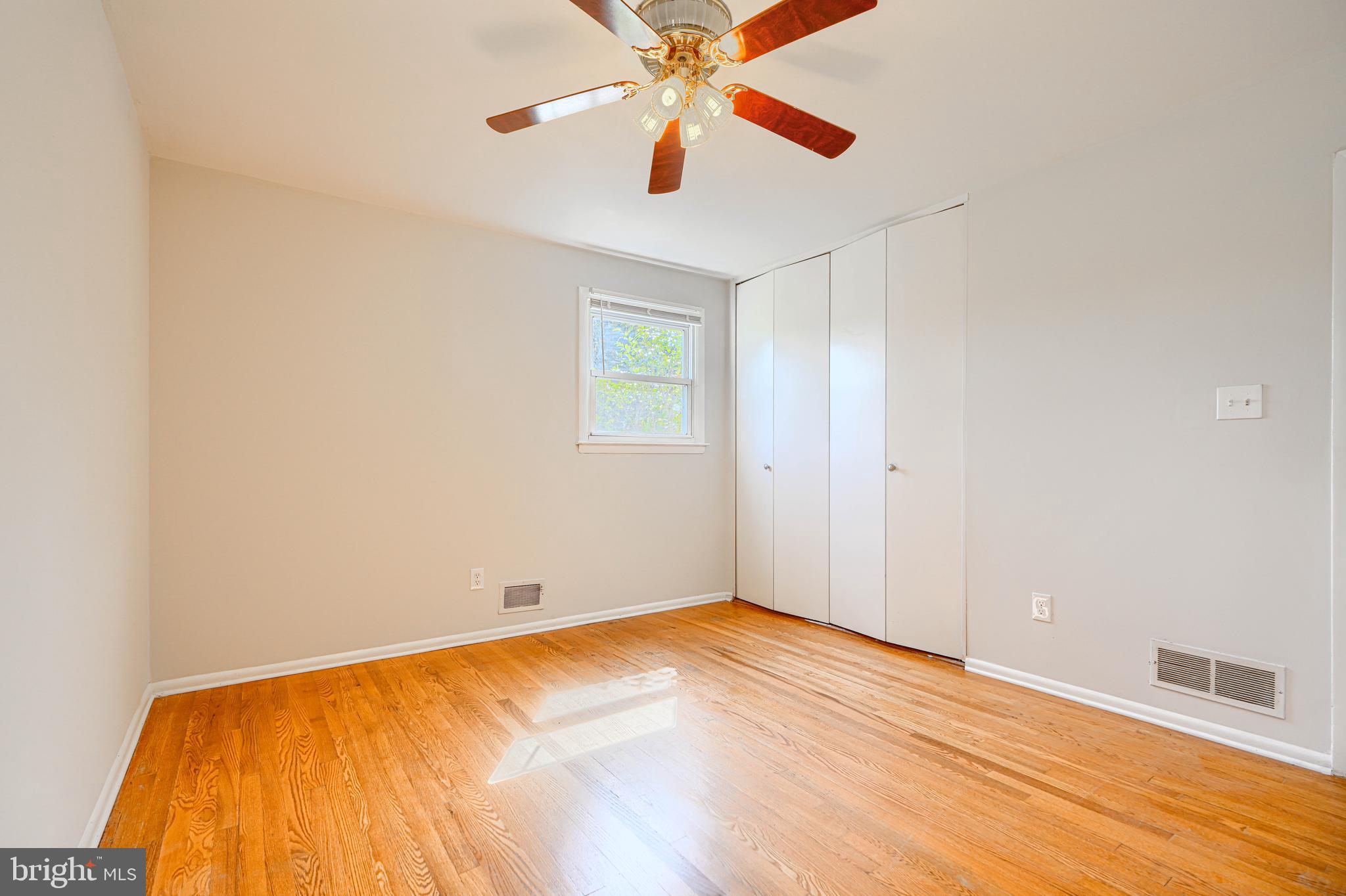 1741 Ellinwood Road Rosedale, MD 21237 - Photo 20 of 43 a view of empty room with wooden floor and fan