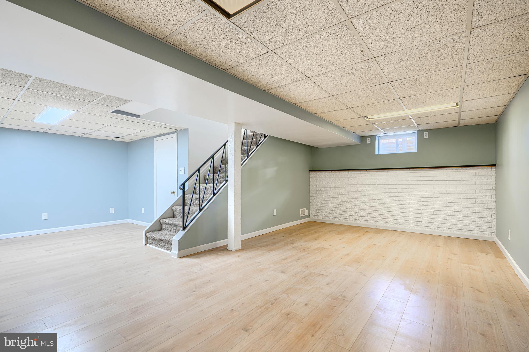 1741 Ellinwood Road Rosedale, MD 21237 - Photo 30 of 43 a view of an empty room with wooden floor