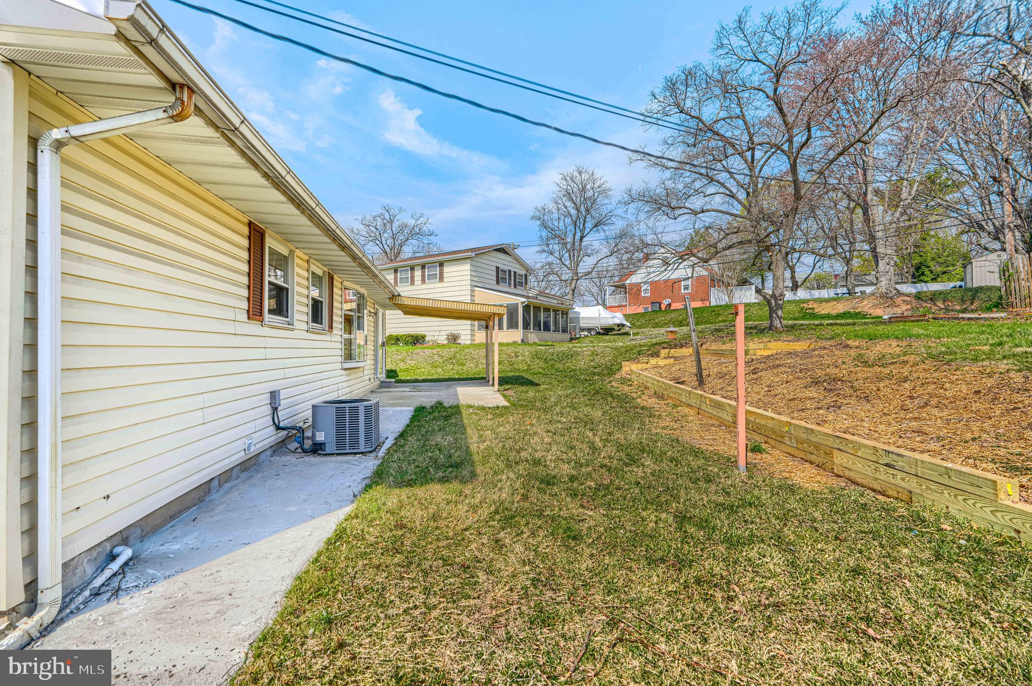 1741 Ellinwood Road Rosedale, MD 21237 - Photo 38 of 43 a view of a house with a yard