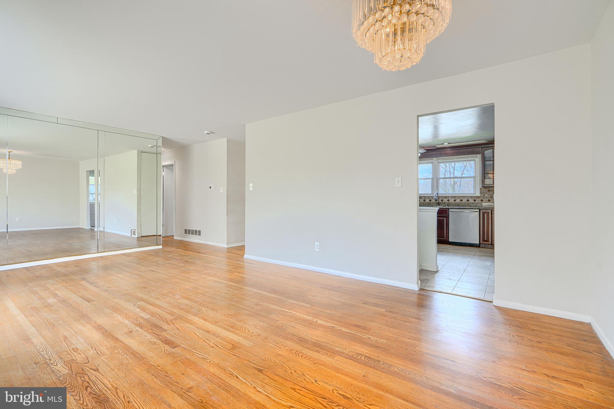 1741 Ellinwood Road Rosedale, MD 21237 - Photo 4 of 43 a view of empty room with wooden floor