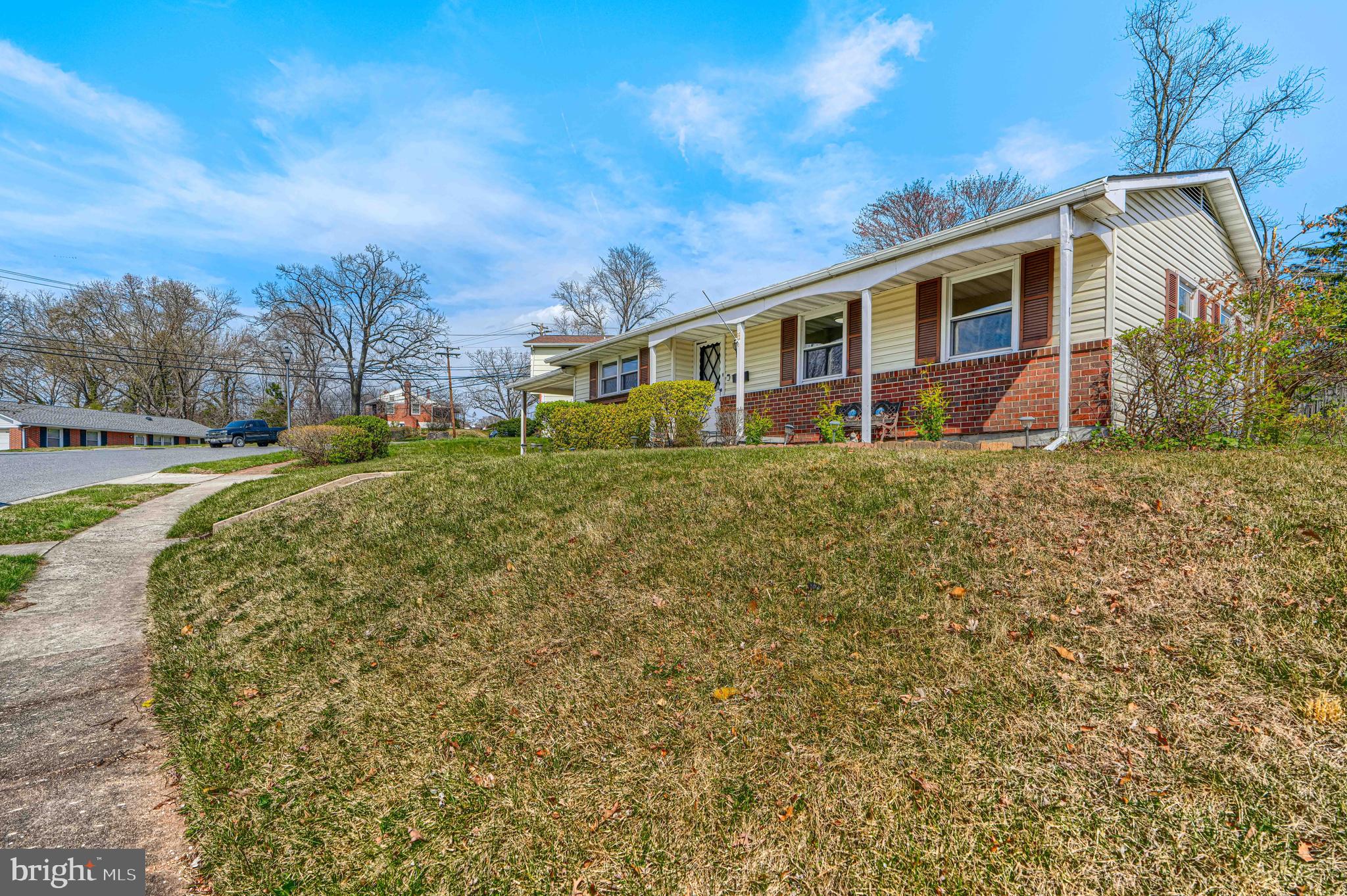 1741 Ellinwood Road Rosedale, MD 21237 - Photo 41 of 43 a view of a yard in front of a house with large trees