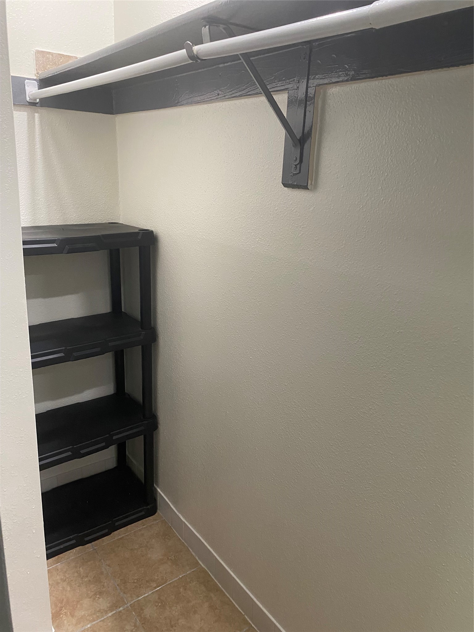 3107 Raccoon Run Spring, TX 77373 - Photo 23 of 35 Master bedroom walk-in closet with shelves