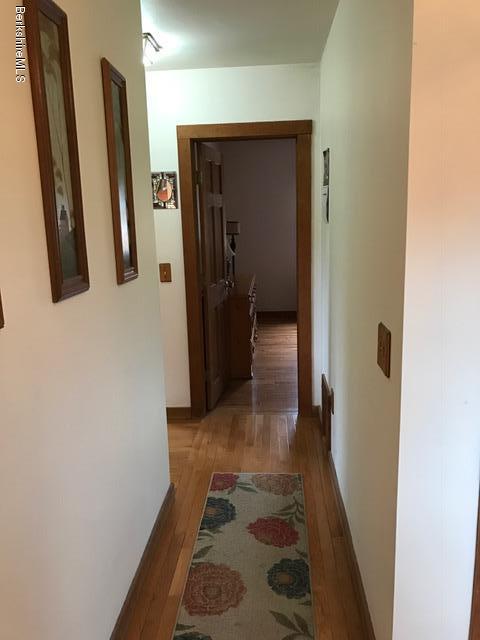 223 Bailey Hill Road Readsboro, VT 05350 - Photo 32 of 42 2nd floor hall with oak floor