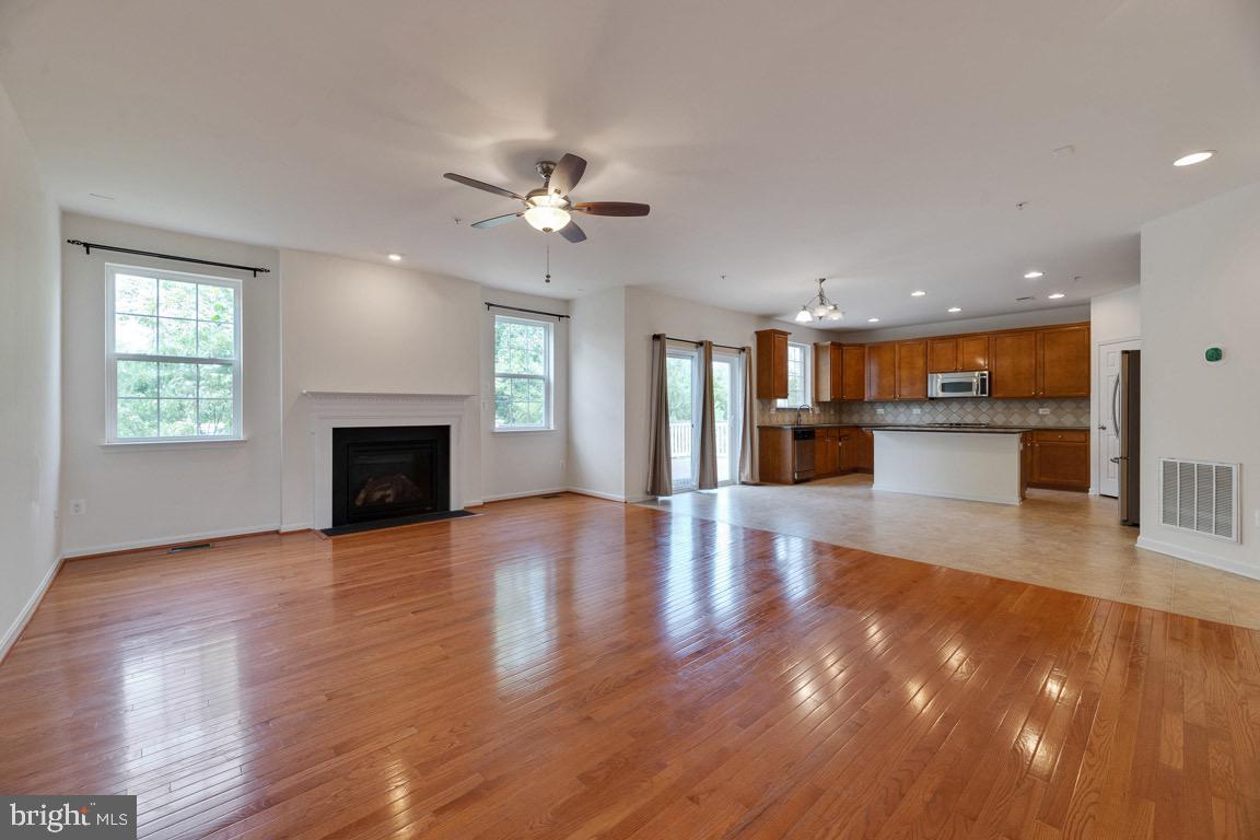 6314 Old Washington Road Elkridge, MD 21075 - Photo 15 of 52 Spacious Family Room w/ Fireplace Open to Kitchen