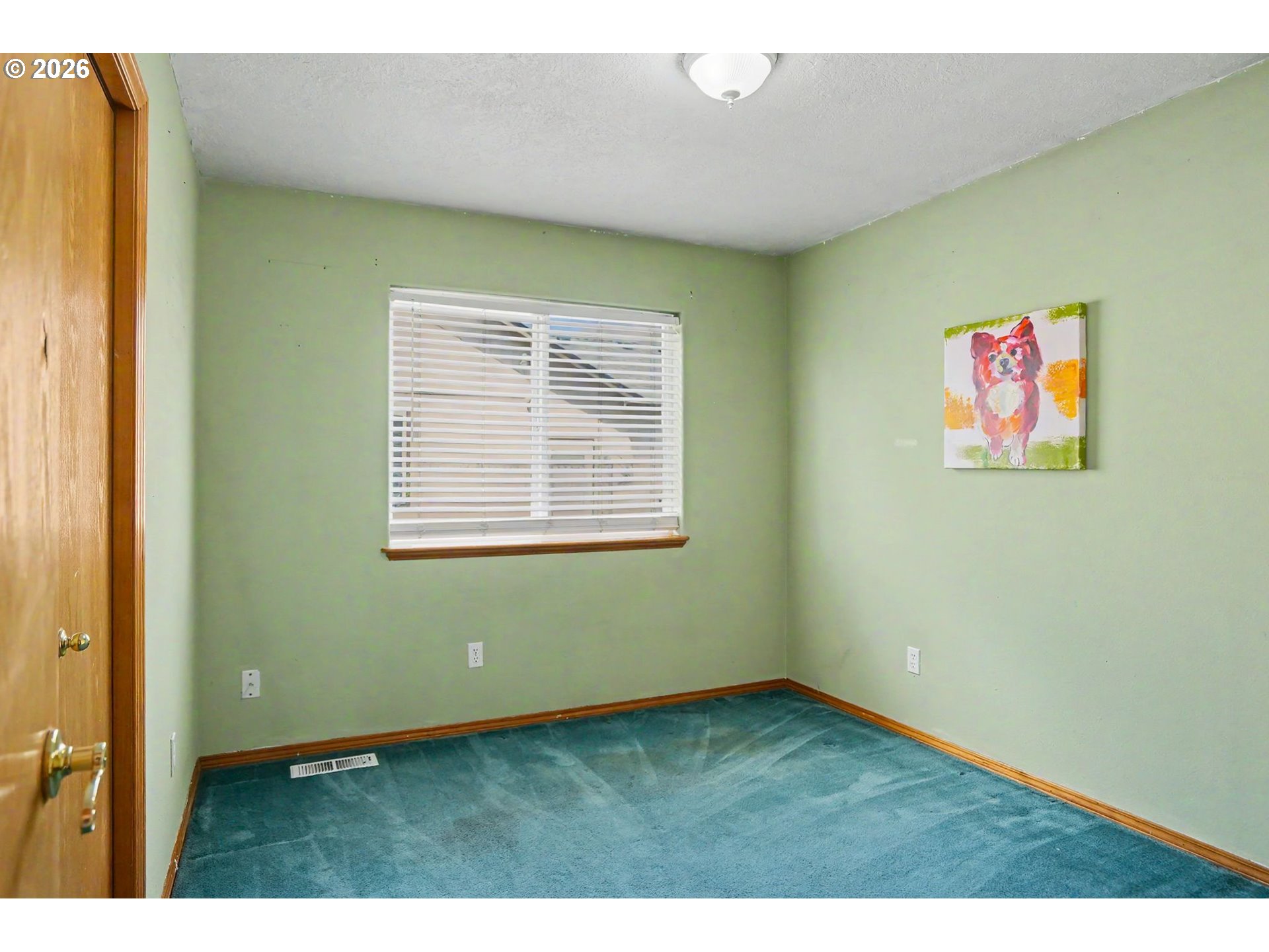 2662 South 12th Street Lebanon, OR 97355 - Photo 18 of 38 a view of an empty room with a window