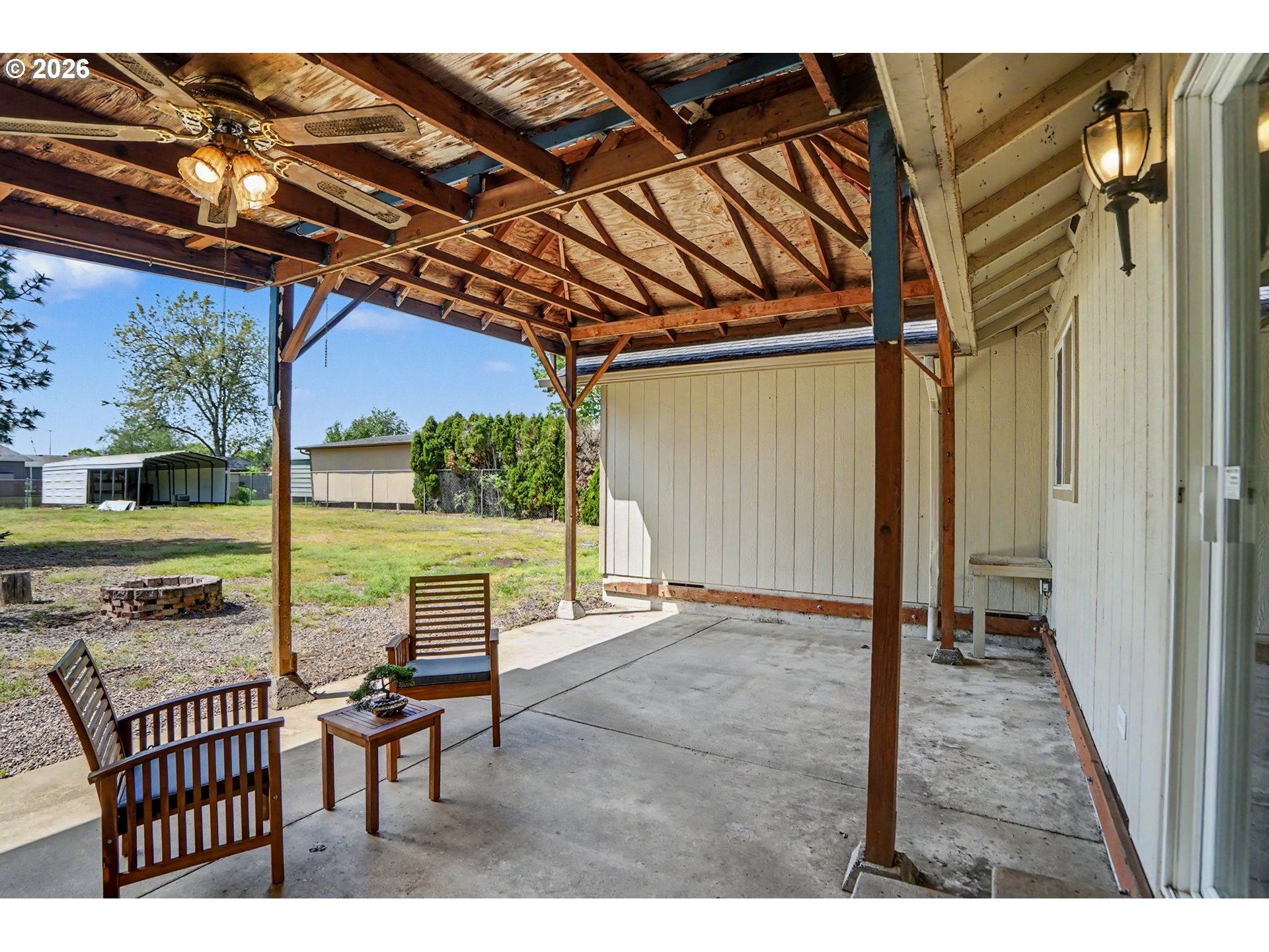 2662 South 12th Street Lebanon, OR 97355 - Photo 28 of 38 a view of a porch with furniture and a yard
