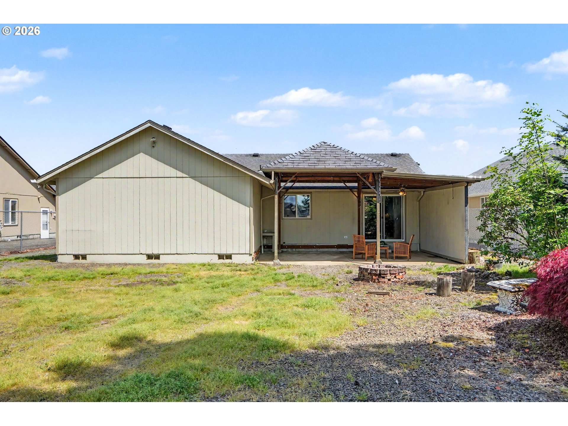 2662 South 12th Street Lebanon, OR 97355 - Photo 31 of 38 a view of an house with backyard and garden
