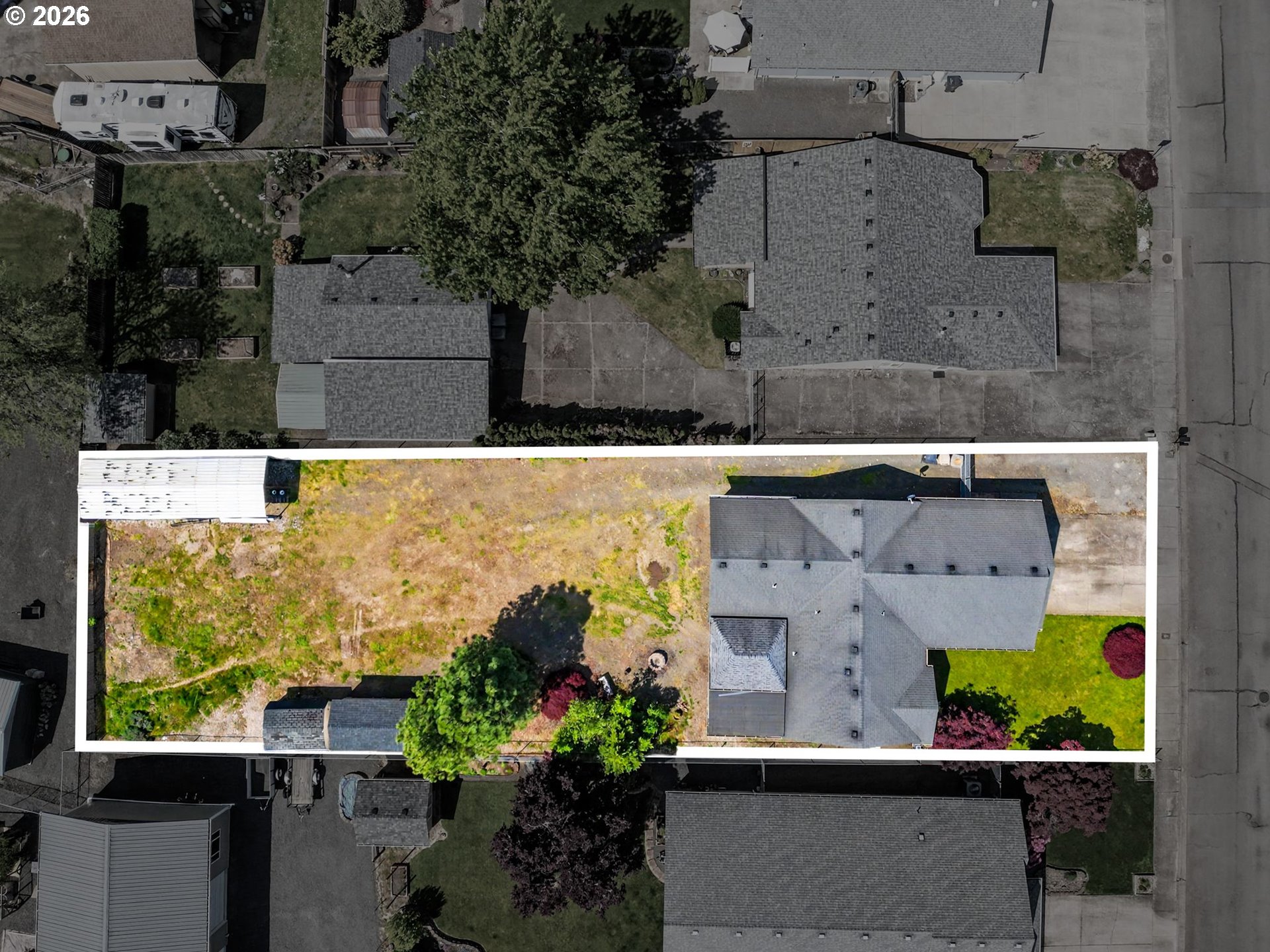 2662 South 12th Street Lebanon, OR 97355 - Photo 5 of 38 an aerial view of a house with a yard