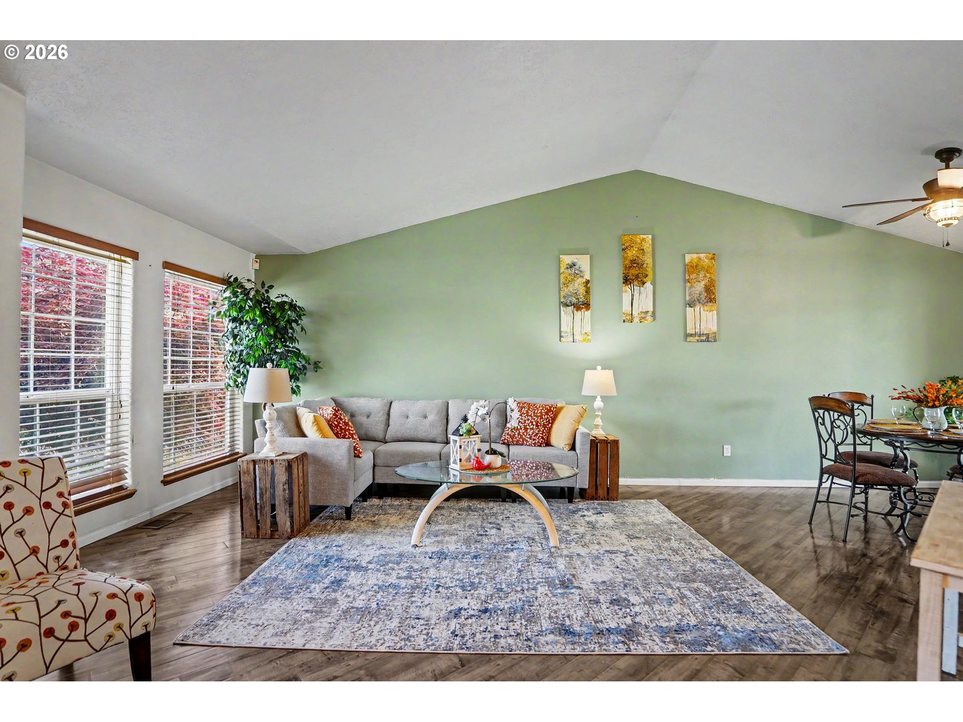 2662 South 12th Street Lebanon, OR 97355 - Photo 7 of 38 a living room with furniture wooden floor and floor to ceiling windows