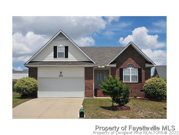 5432 Arnette Road Hope Mills, NC 28348 - Photo 1 of 25 a house view with a outdoor space