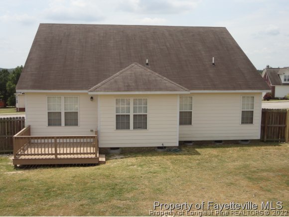 5432 Arnette Road Hope Mills, NC 28348 - Photo 24 of 25 a front view of a house with a garden