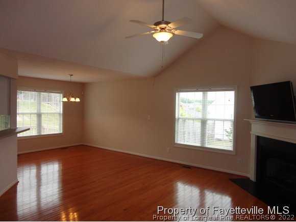 5432 Arnette Road Hope Mills, NC 28348 - Photo 4 of 25 a view of empty room with wooden floor and fan