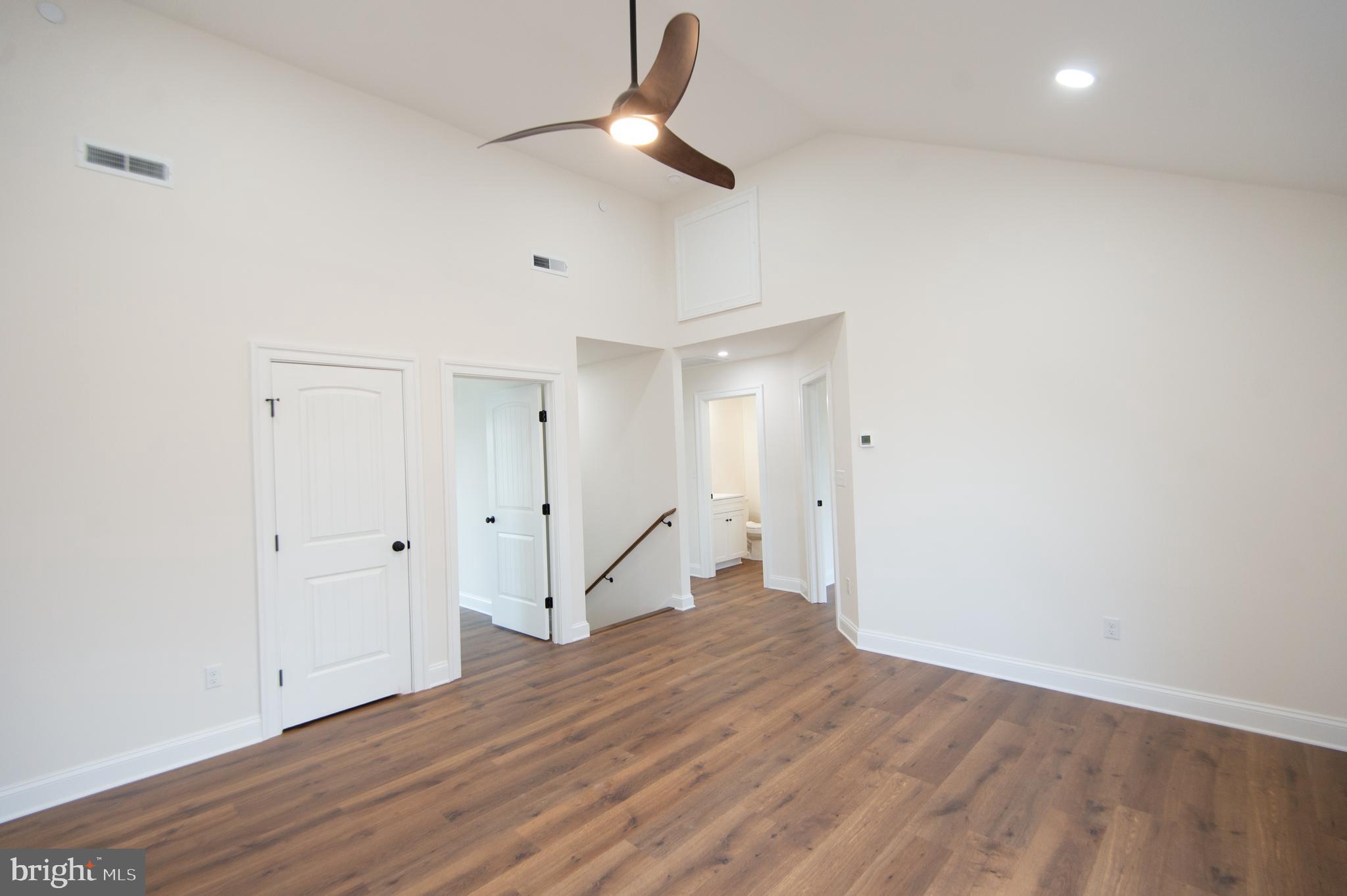 120 Academy Street Secretary, MD 21664 - Photo 23 of 46 a view of empty room with wooden floor