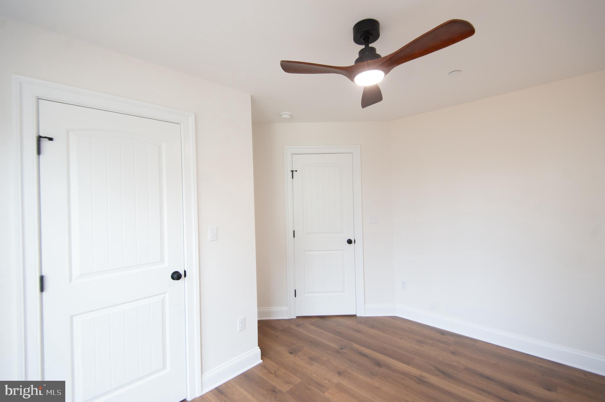 120 Academy Street Secretary, MD 21664 - Photo 32 of 46 a view of a room with wooden floor