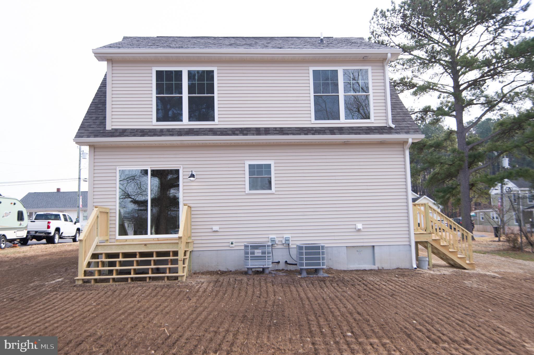 120 Academy Street Secretary, MD 21664 - Photo 40 of 46 a front view of a house with windows